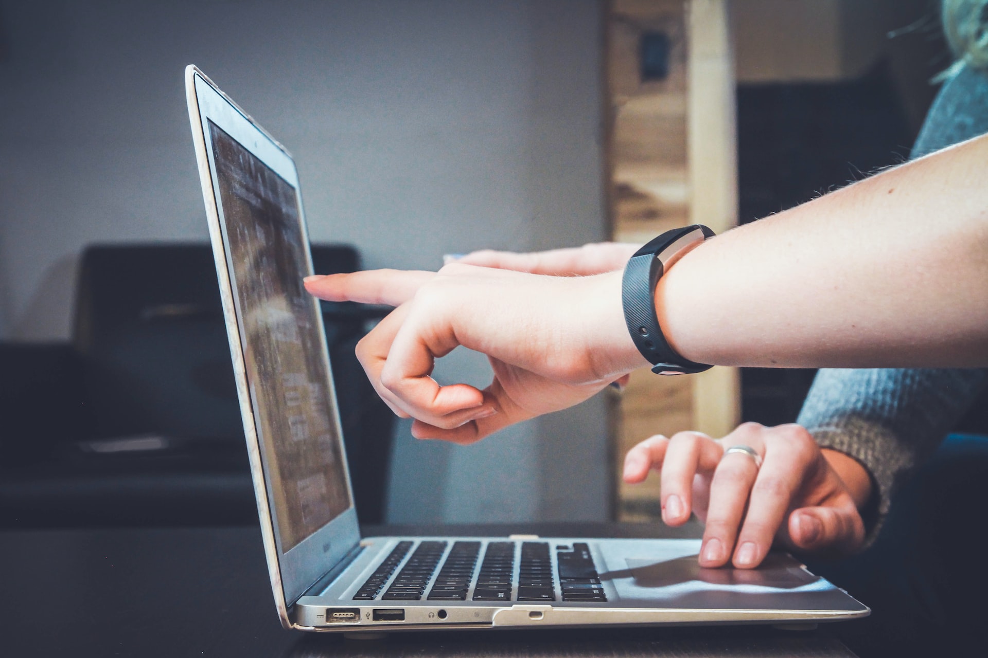 Pointing at a website on a computer